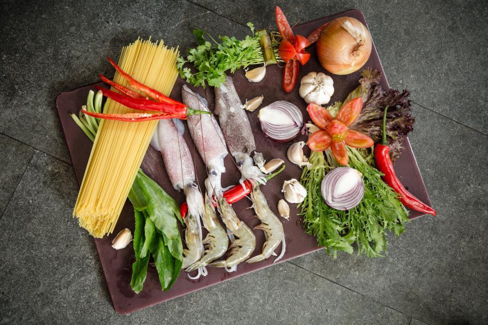 Free Image of Ingredients for Italian cuisine on stone slab 