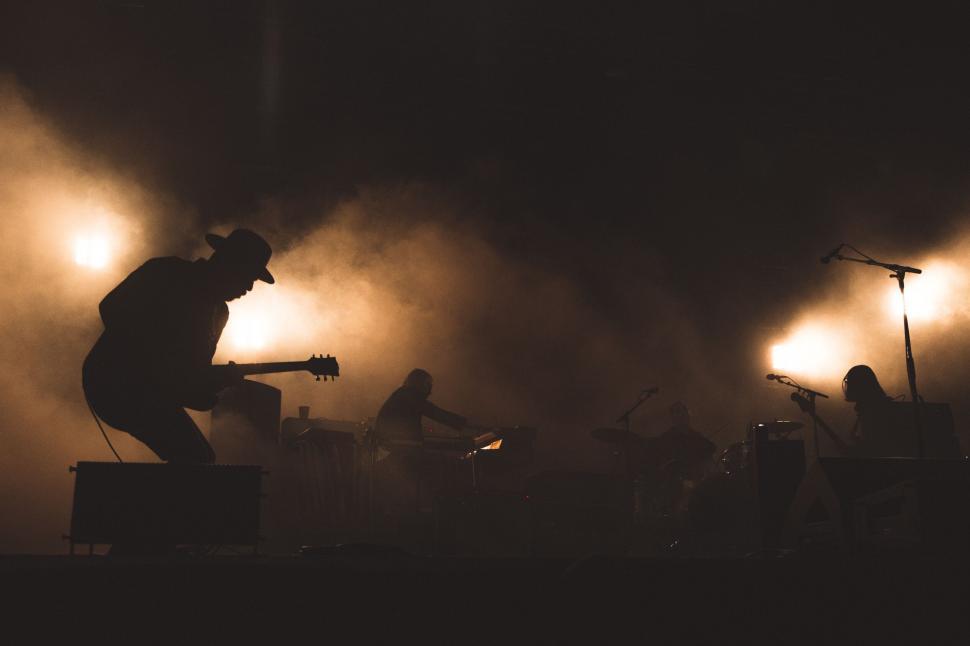 Free Image of Silhouette of a band performing on stage 