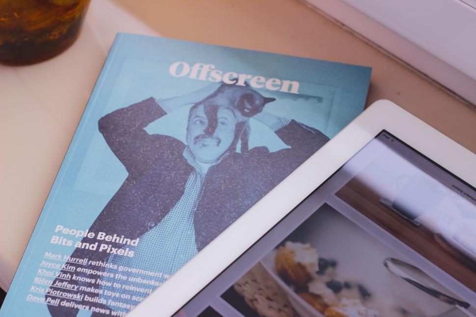 Free Image of Printed magazine with blurred out content 