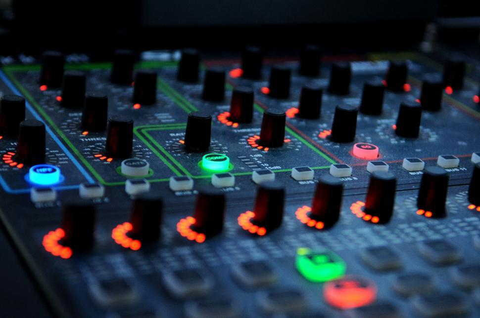 Free Image of Audio mixer with colorful illuminated buttons 