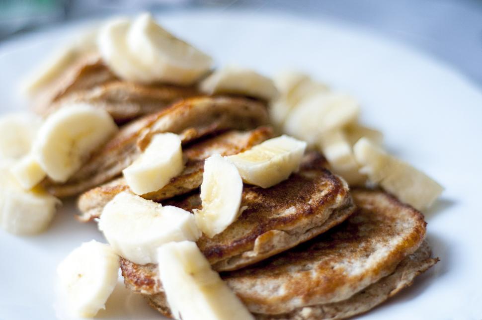 Free Image of Fresh banana pancakes on a white plate 