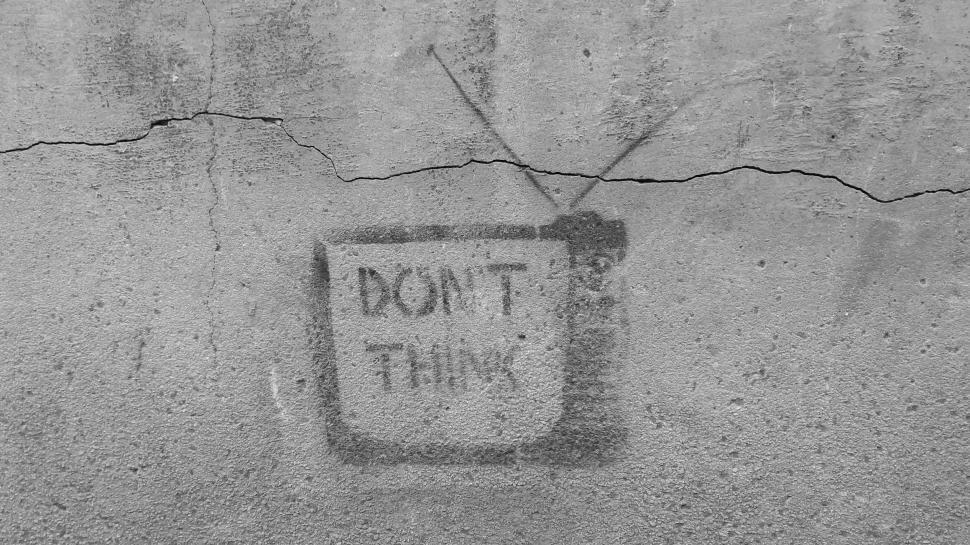 Free Image of Don t think television graffiti on wall 