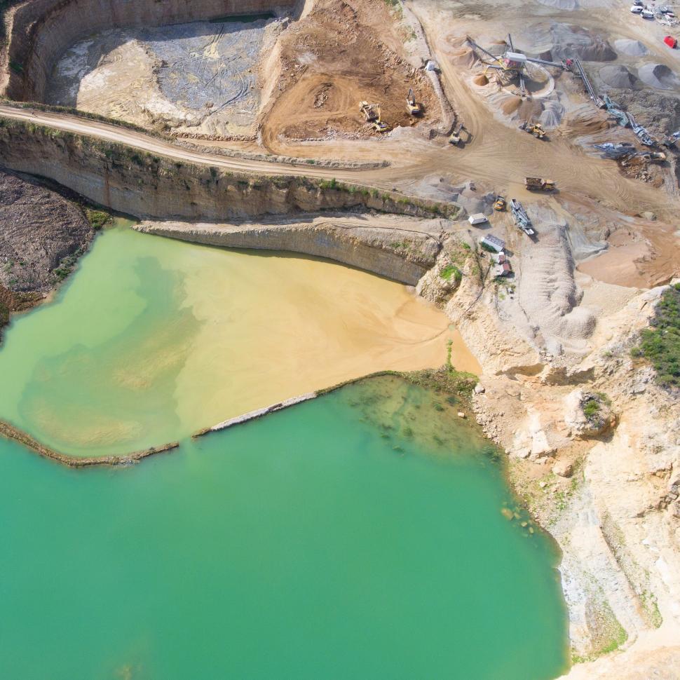 Free Image of Aerial shot of a quarry and machinery 