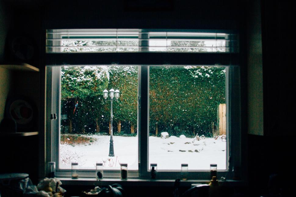 Free Image of Cozy winter view through a window pane 