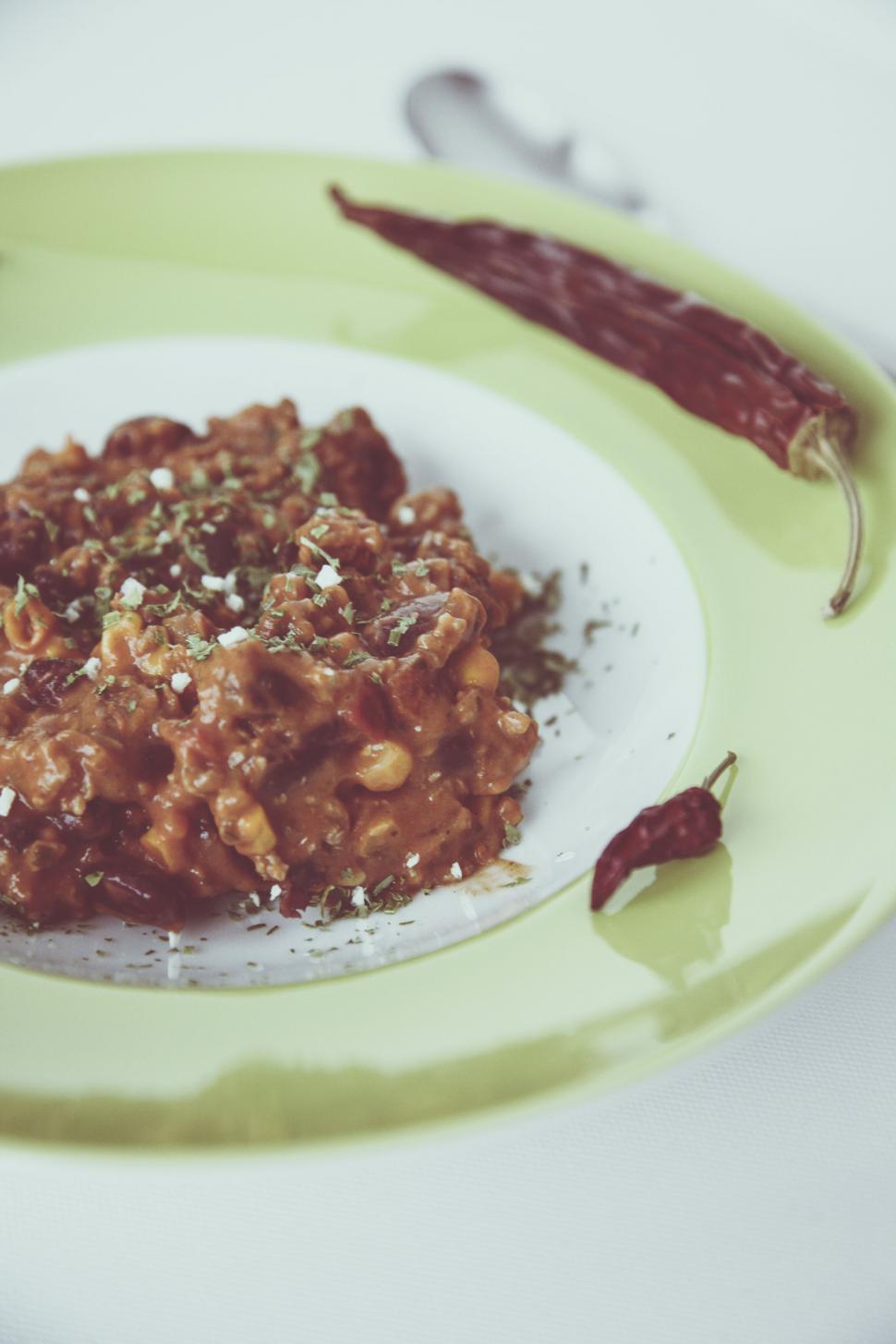 Free Image of Plate of spicy risotto on white table 