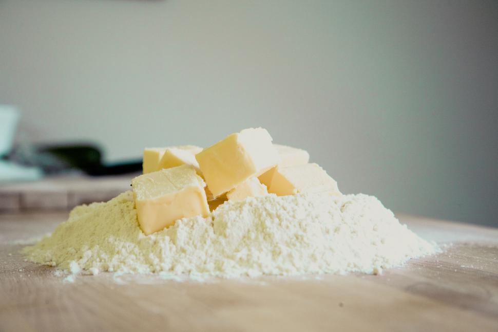 Free Image of Pile of butter and flour on table 