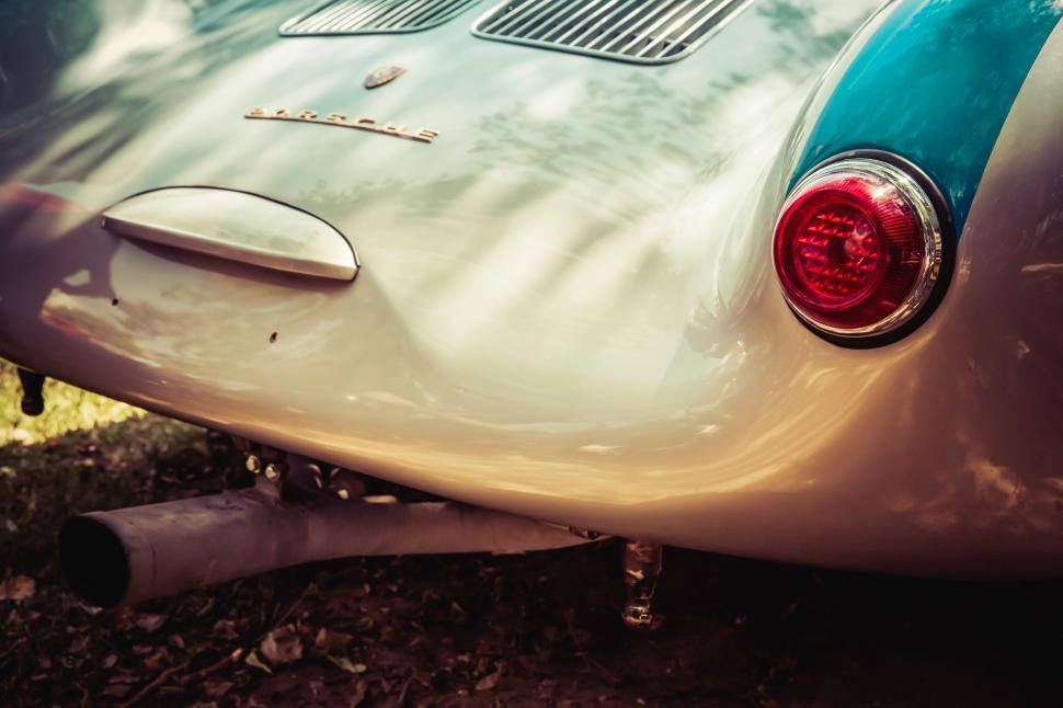 Free Image of Vintage car rear with red taillight 