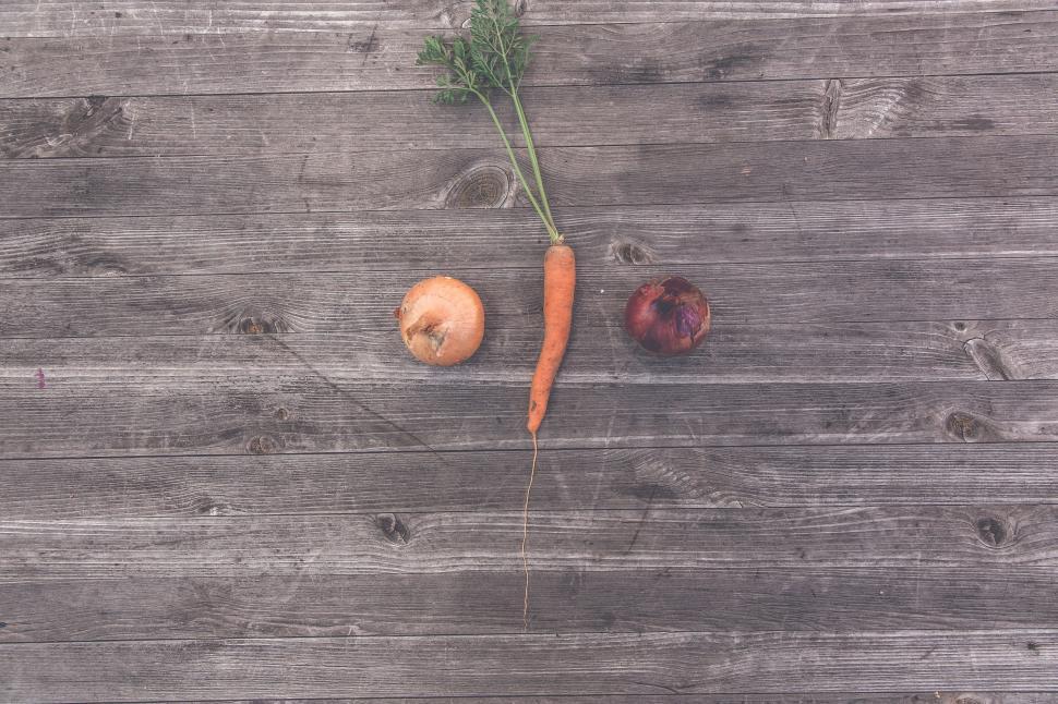 Free Image of Three vegetables on a rustic wooden table 