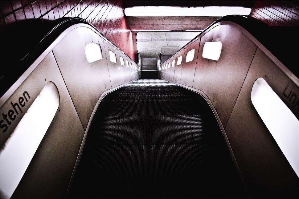 Free Image of Escalator tunnel in a modern subway station 