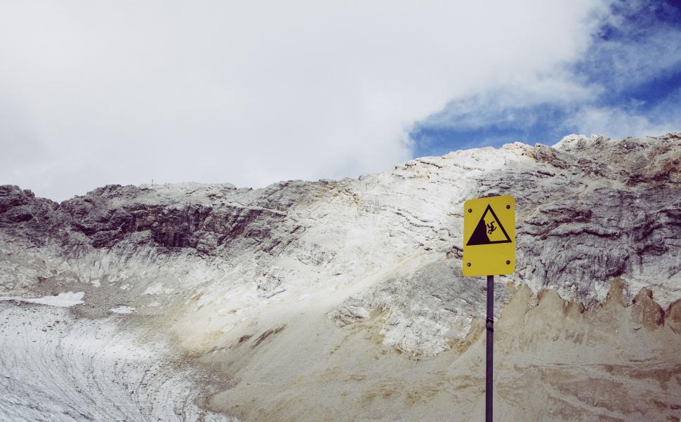 Free Image of Mountain Landscape with Caution Sign 