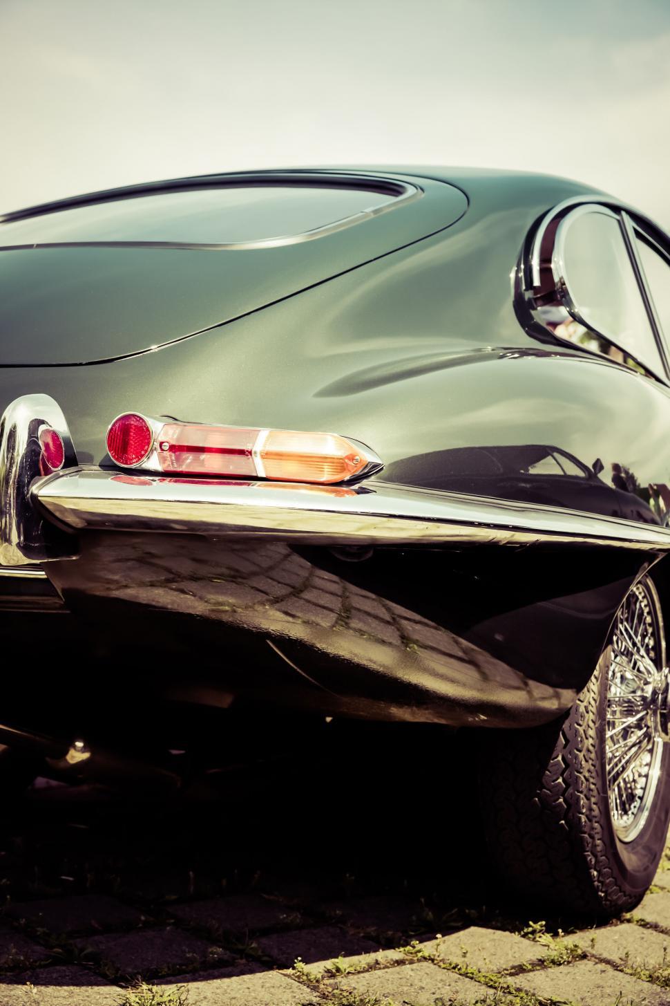 Free Image of Vintage car rear view with stylish tail lights 
