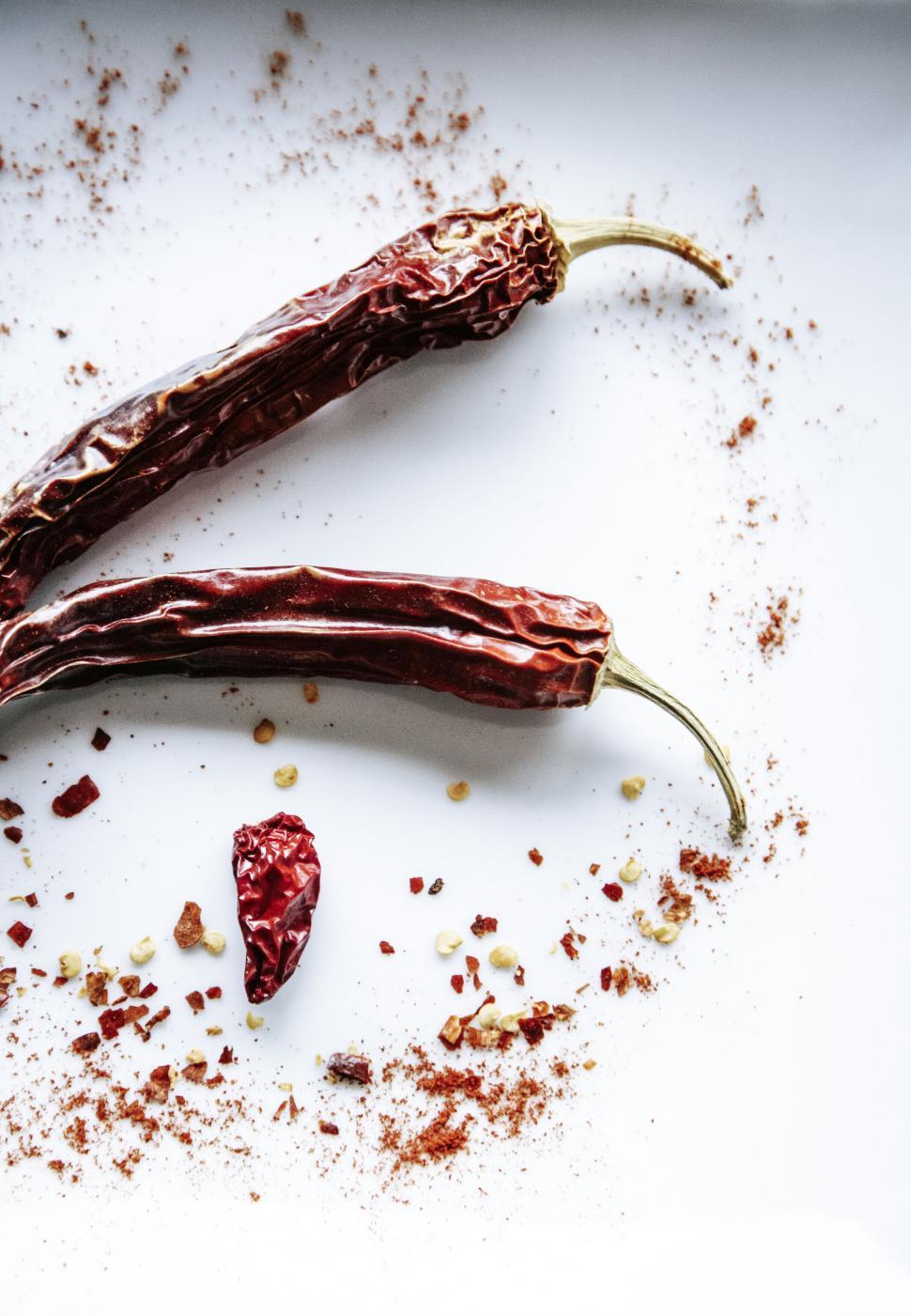 Free Image of Red chili peppers on a white background 