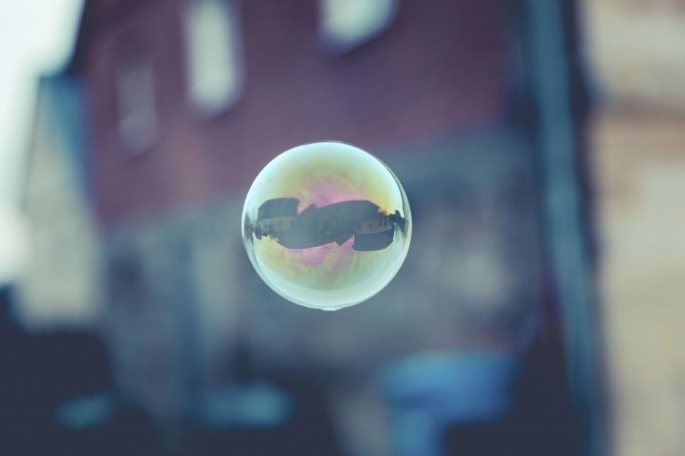 Free Image of Reflection of houses in a floating bubble 
