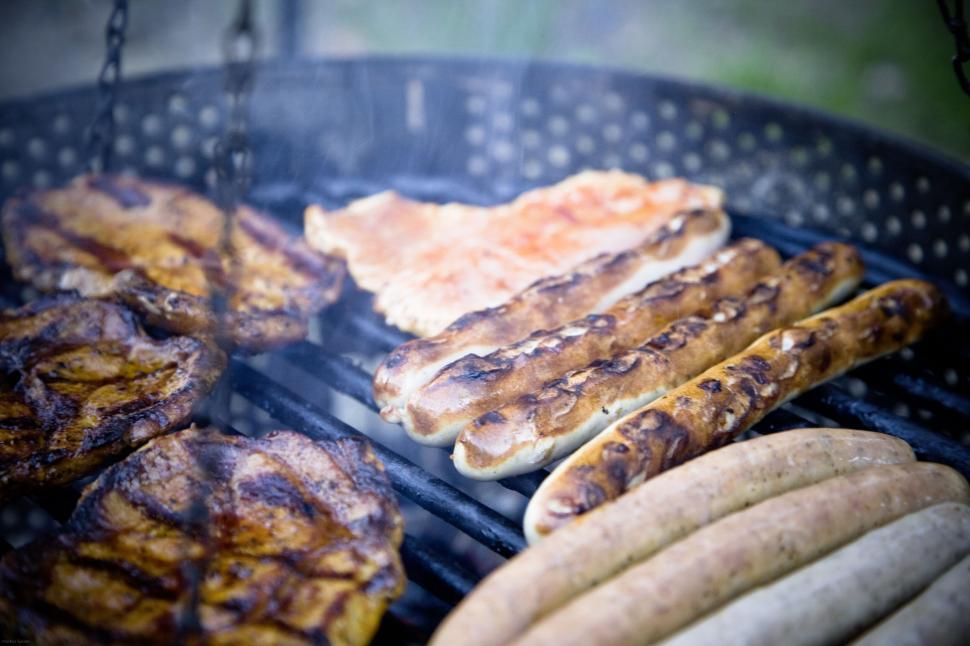 Free Image of Grilled meats and sausages on a summer BBQ 