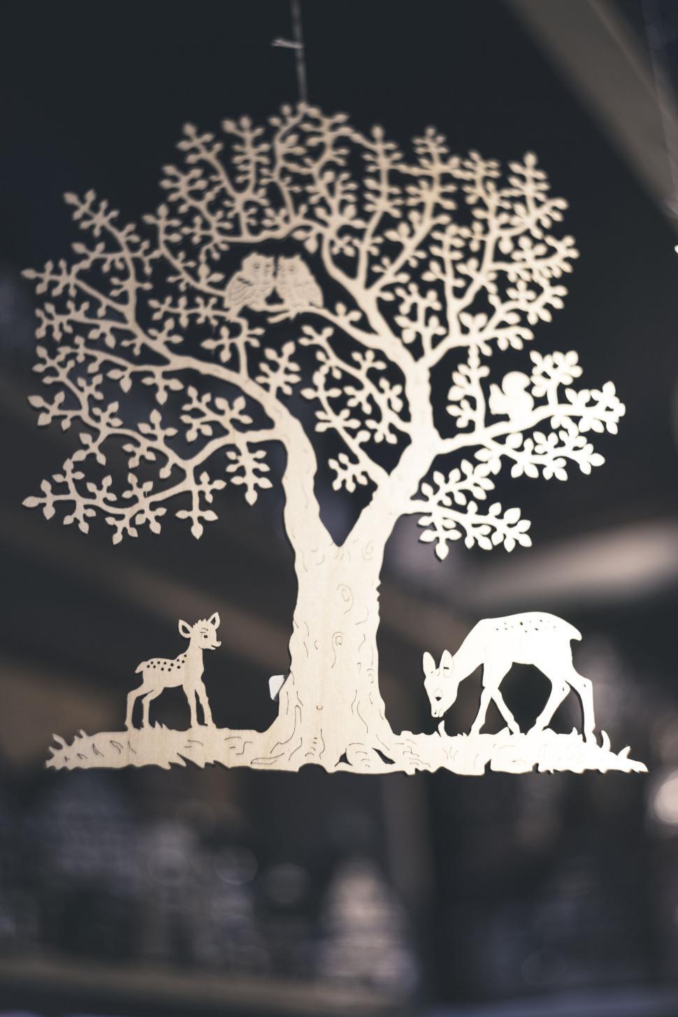Free Image of Artistic paper tree and deer cutout 