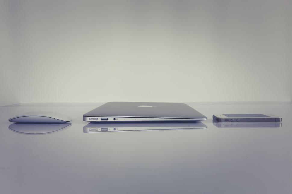 Free Image of Minimalistic tech gadgets on white surface 