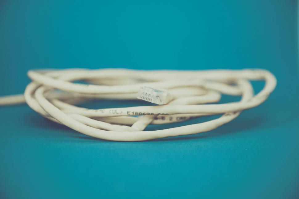 Free Image of Ethernet cable on a blue background 
