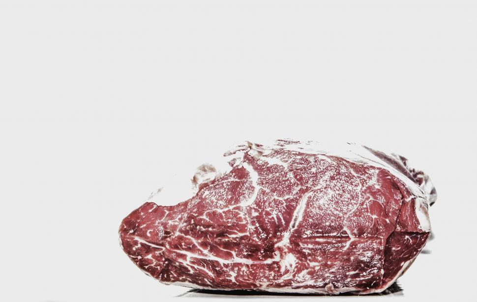 Free Image of Raw red meat on a white background 