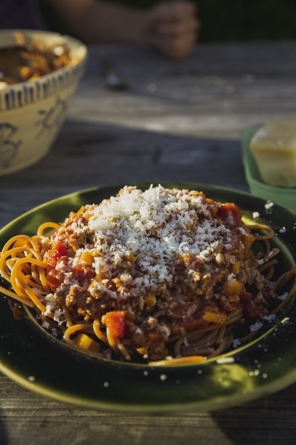 Free Image of Plate of spaghetti with bolognese and cheese 