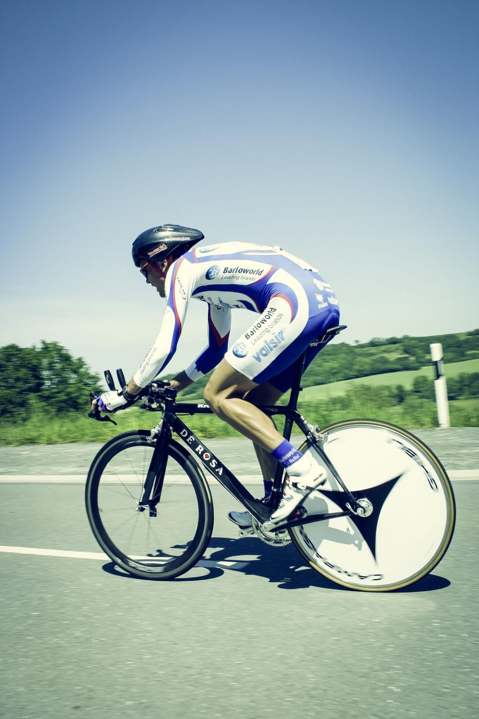 Free Image of Cyclist in motion on a road race 