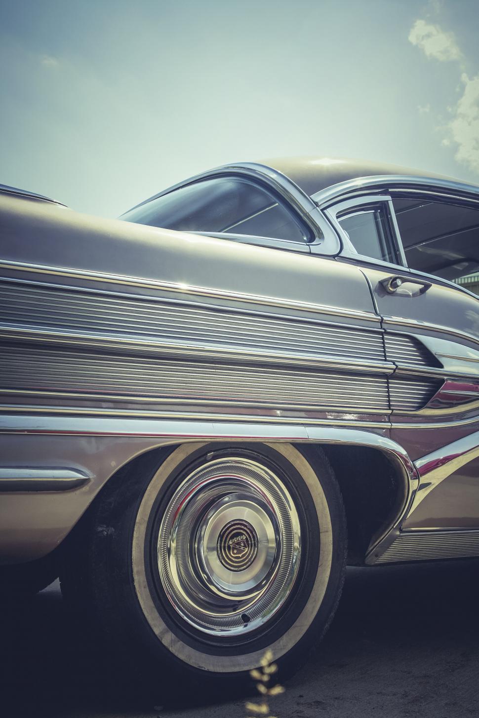 Free Image of Vintage car showcasing shiny chrome details 