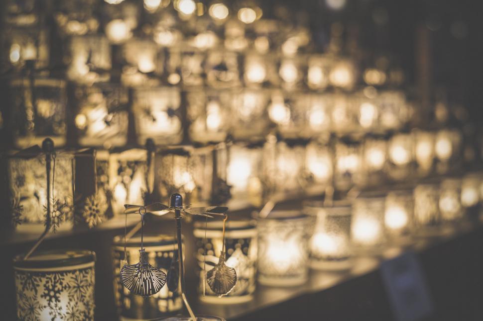 Free Image of Lit candle lanterns at dusk market 