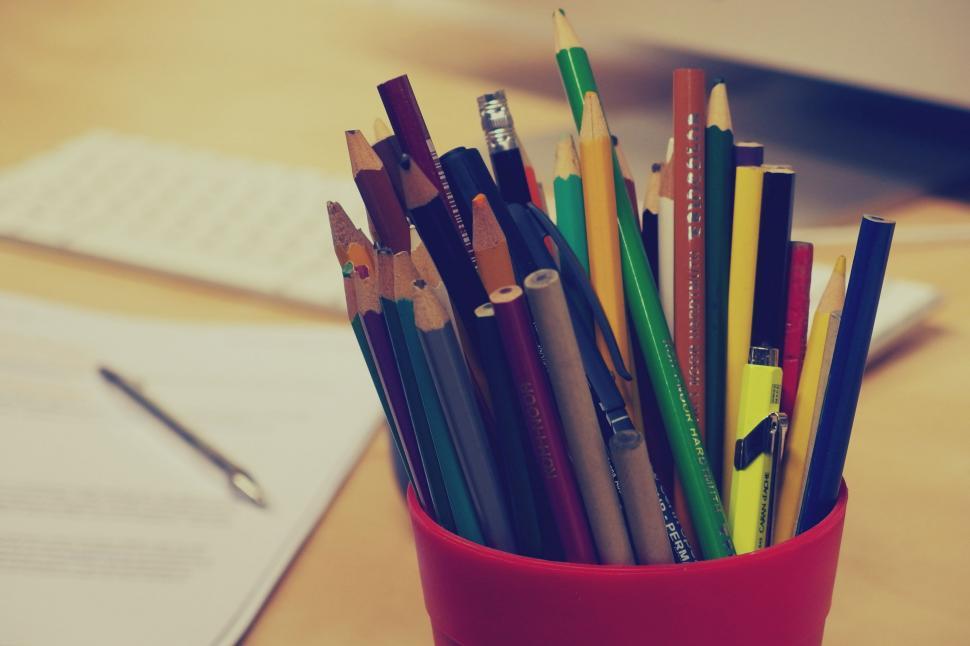 Free Image of Colorful collection of writing pencils in cup 