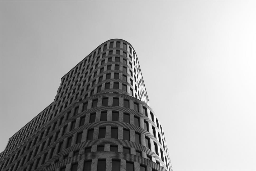 Free Image of Modern curved building in black and white 