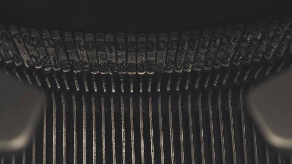 Free Image of Detail shot of vintage typewriter letter keys 