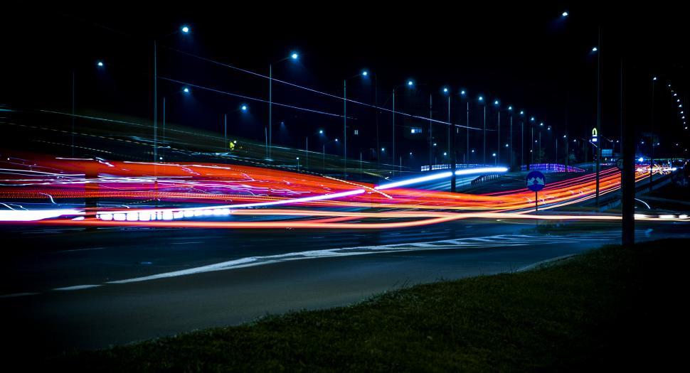 Free Image of Long exposure shot of city traffic at night 