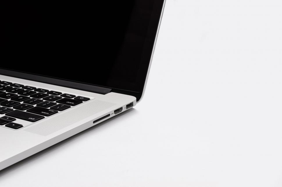 Free Image of Laptop with open screen on white surface 