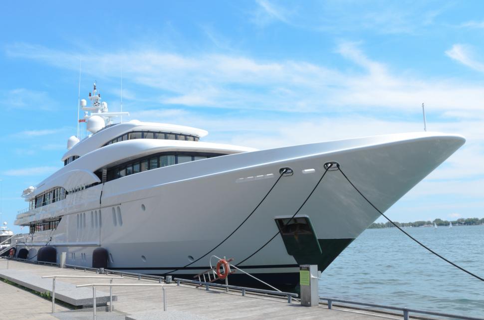 Free Image of Luxurious yacht docked on a calm day 