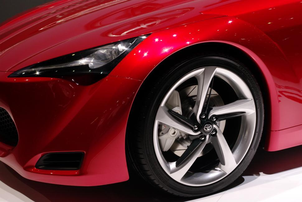 Free Image of Close Up of a Red Sports Car on Display 