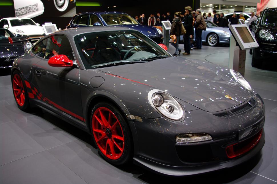 Free Image of Gray Car With Red Rims on Display at Car Show 