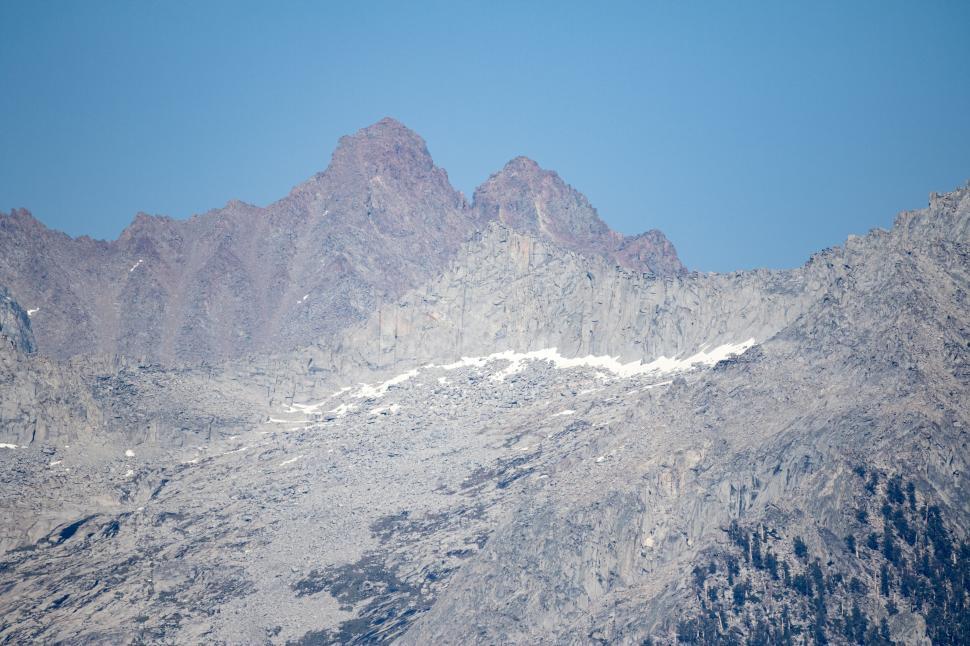Free Image of Rugged mountain peaks against clear sky 