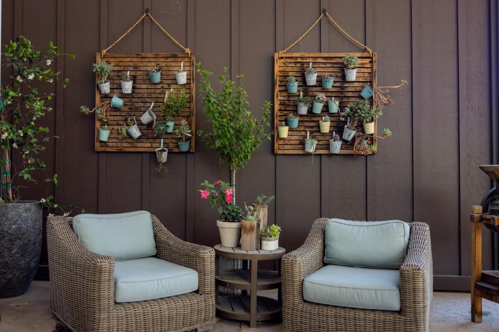 Free Image of Cozy outdoor patio with wicker furniture 