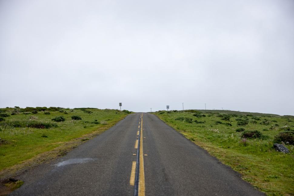 Free Image of Endless Road with Cloudy Sky Horizon 