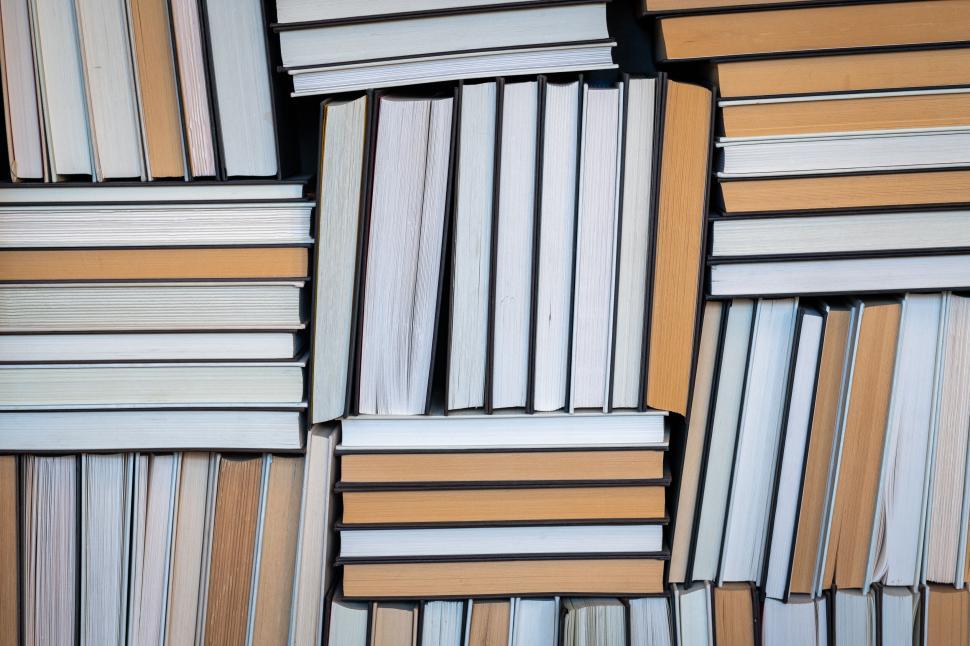 Free Image of Stack of assorted books in a library 