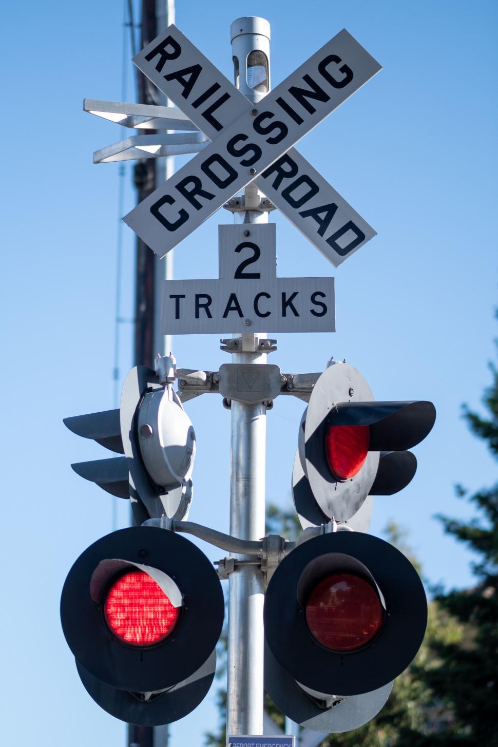 Free Image of Railroad crossing signal stopped train 