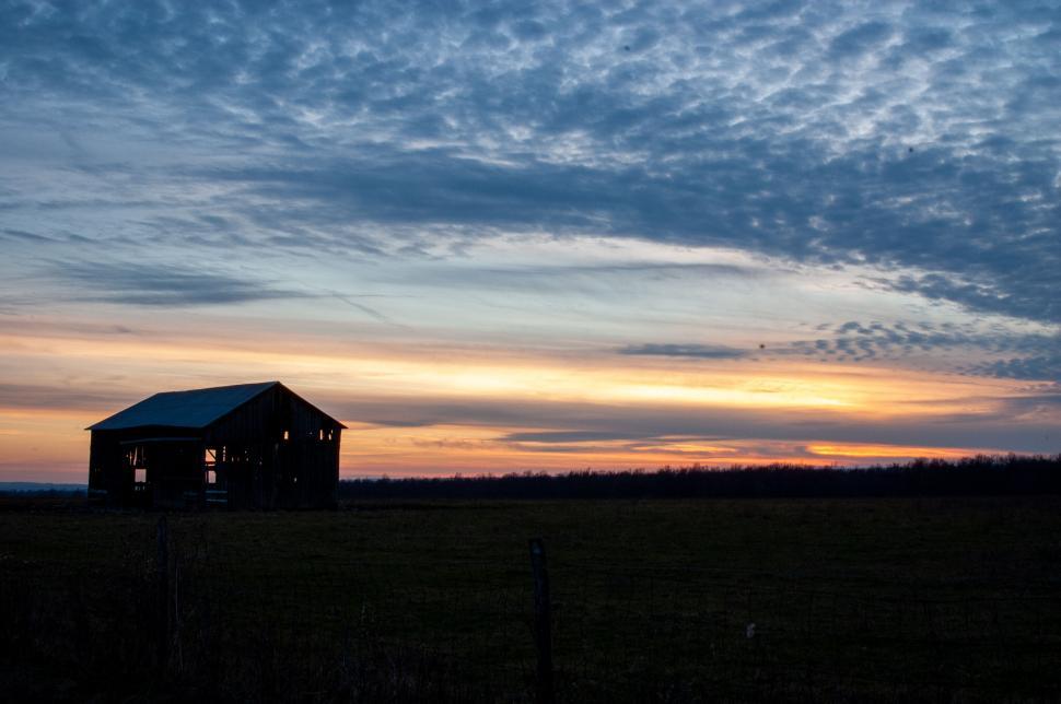 Free Image of Rustic barn at sunset in a rural landscape 