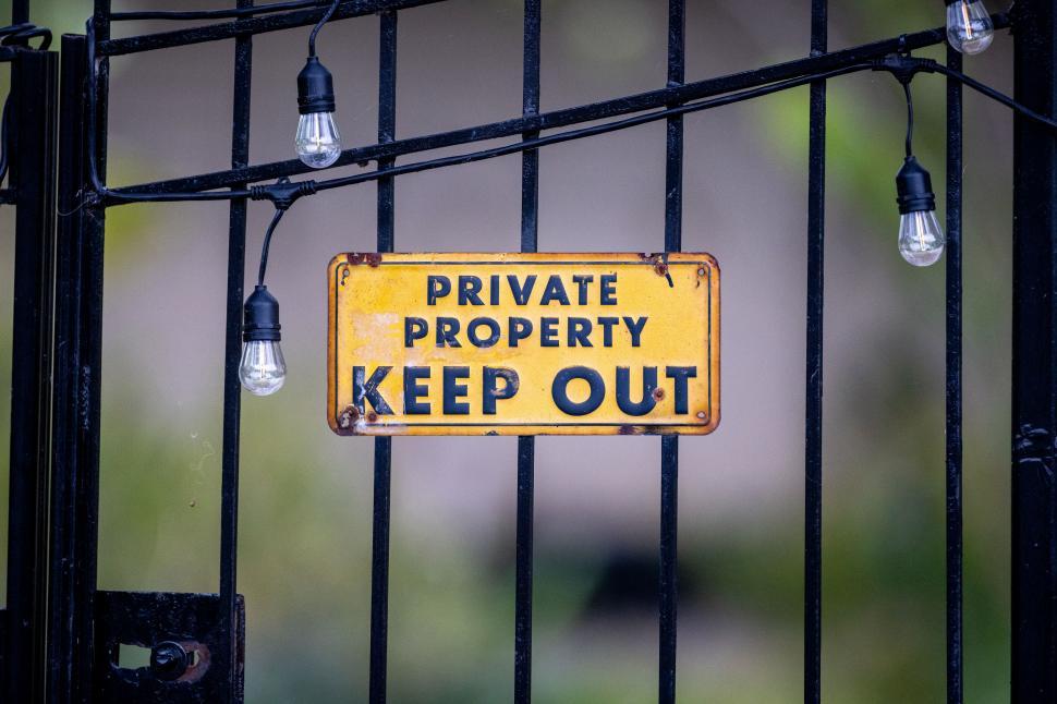 Free Image of Warning sign on a private gate 