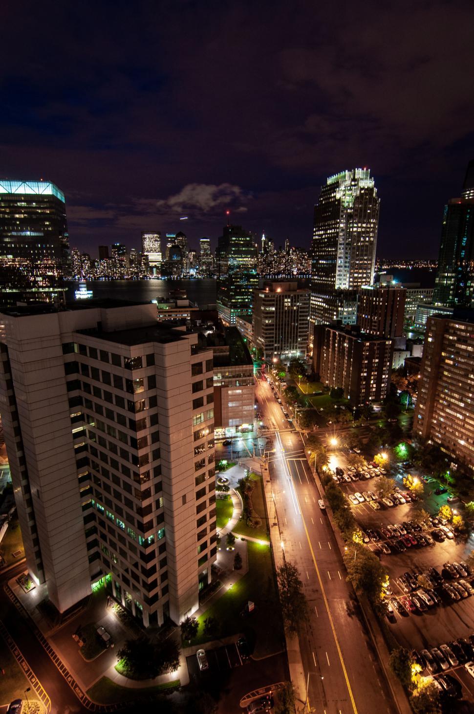 Free Image of Twilight cityscape with illuminated buildings 