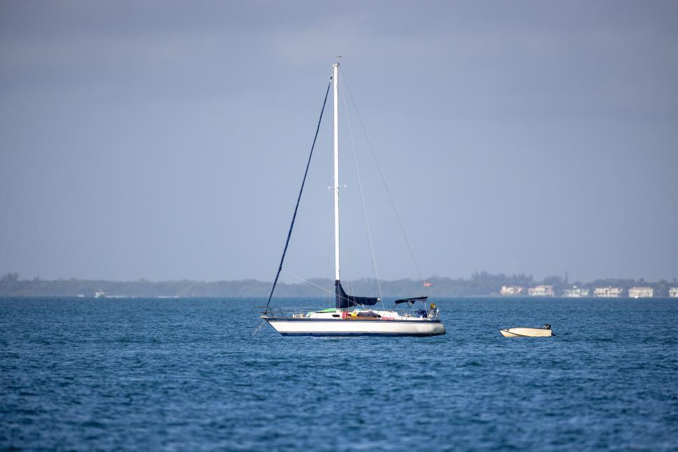 Free Image of Sailboat on calm blue waters 