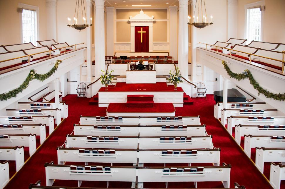 Free Image of Elegant church interior ready for a wedding 