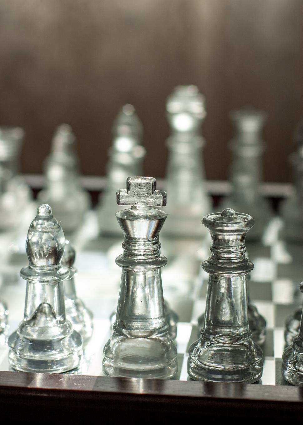 Free Image of Close-up of chess pieces on clear board 