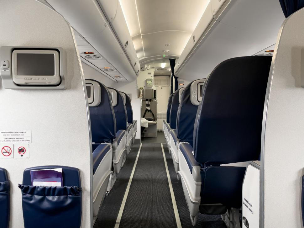 Free Image of Empty airplane cabin and seats view 