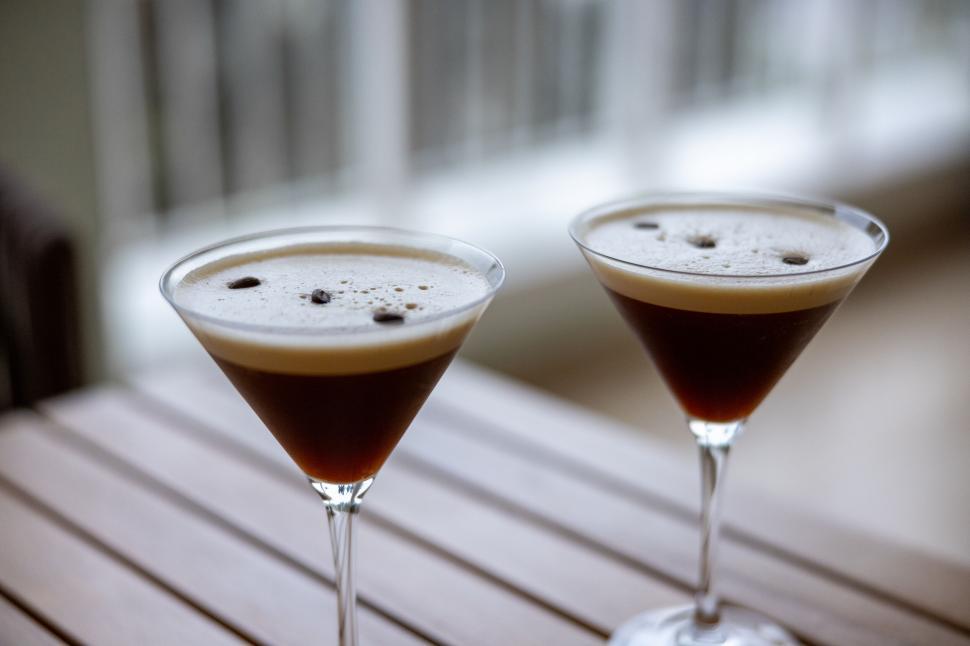 Free Image of Two espresso martinis on a wooden table 
