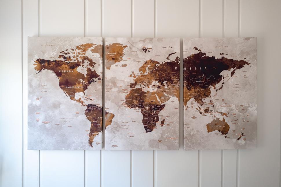 Free Image of Three world map wall art canvases 