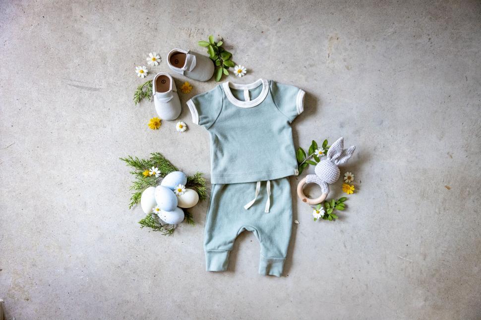 Free Image of Baby clothing and accessories flat lay 