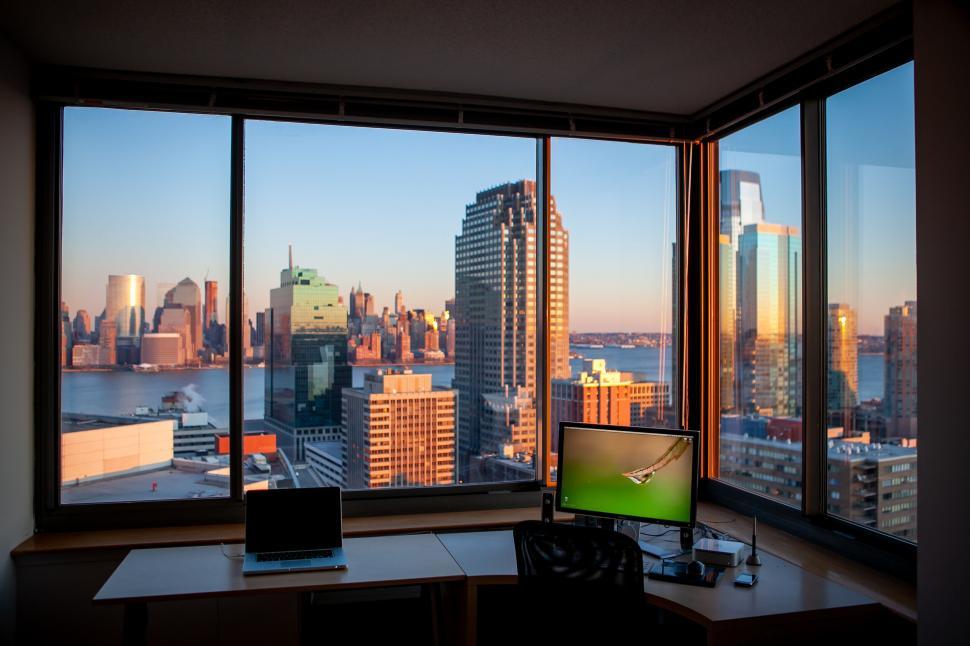 Free Image of Office with a view of the city skyline 
